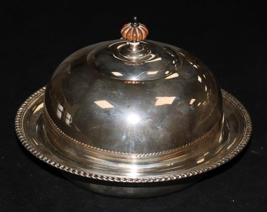 A sterling silver muffin dish, with two covers, Henry Birks & Sons, Canada